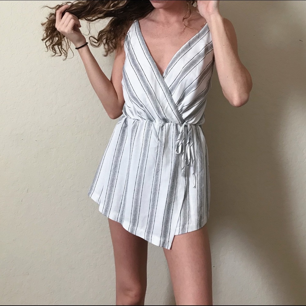 Reverse White romper with black stripes
